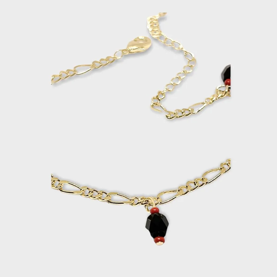 Lucky figaro charm red and black beads 18kts of gold plated bracelet