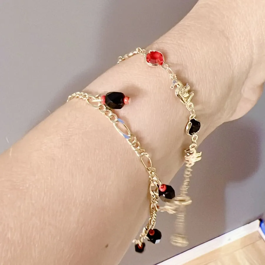 Lucky figaro charm red and black beads 18kts of gold plated bracelet