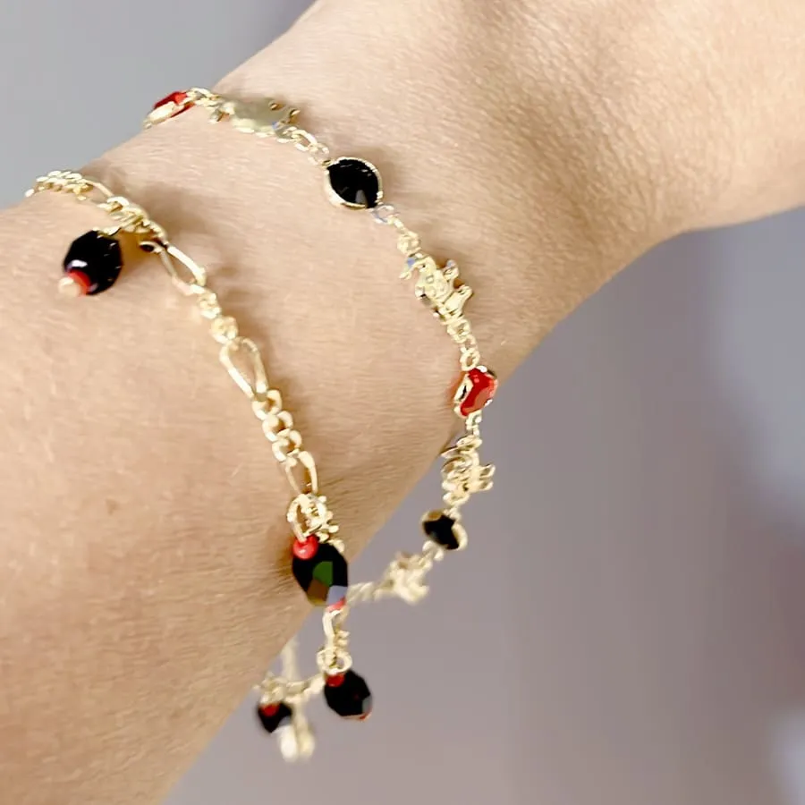 Lucky figaro charm red and black beads 18kts of gold plated bracelet