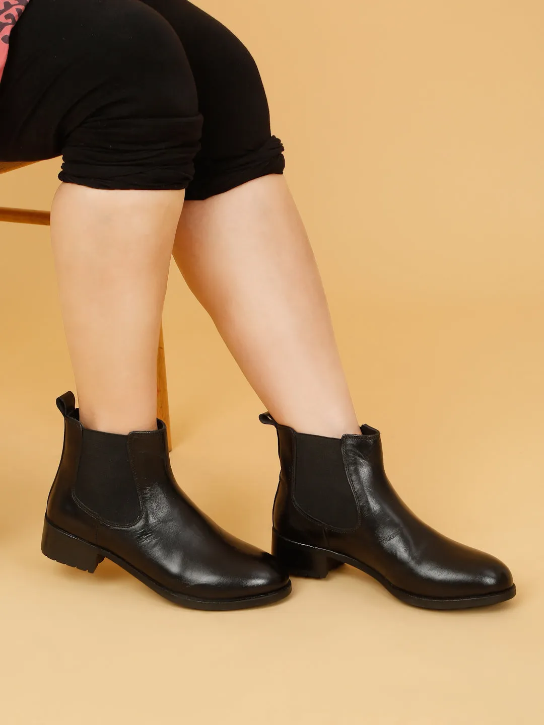 Women's Black Solid Leather Slip-On Blocked Heel Boots